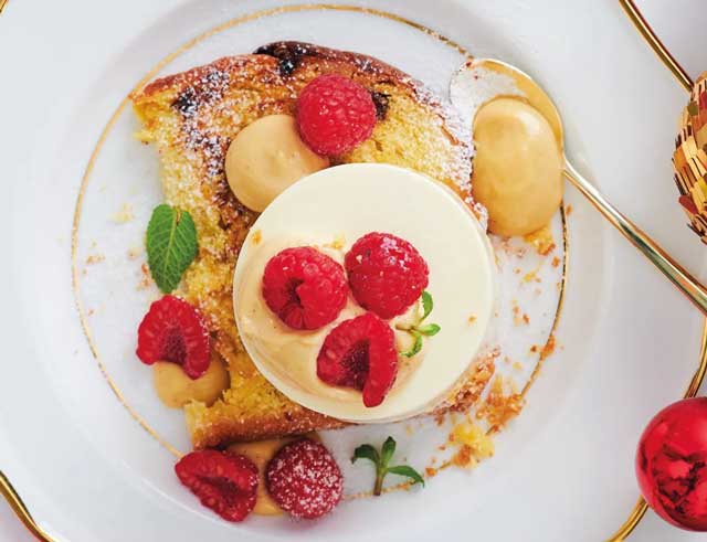 Panettone dessert with ice cream and raspberries