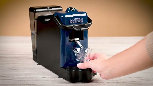 Black and blue Didiesse Didi coffee machine dispensing water